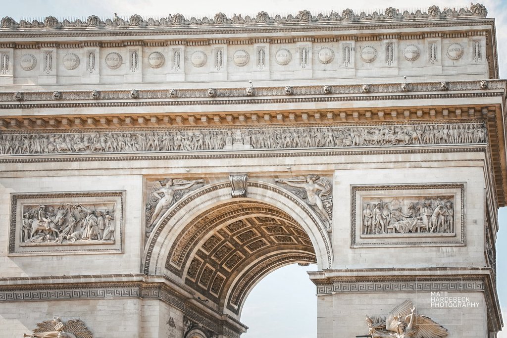 Detailed facade reliefs of the Arc de Triomphe