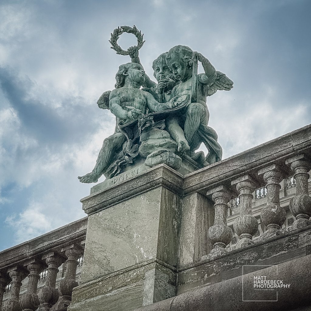 Close-up of “Poesi” sculpture on the Royal Palace facade in Stockholm