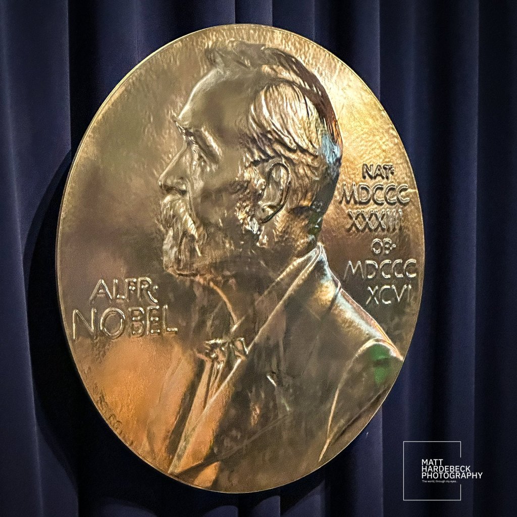 Close-up of a large Nobel Prize medal featuring Alfred Nobel’s profile