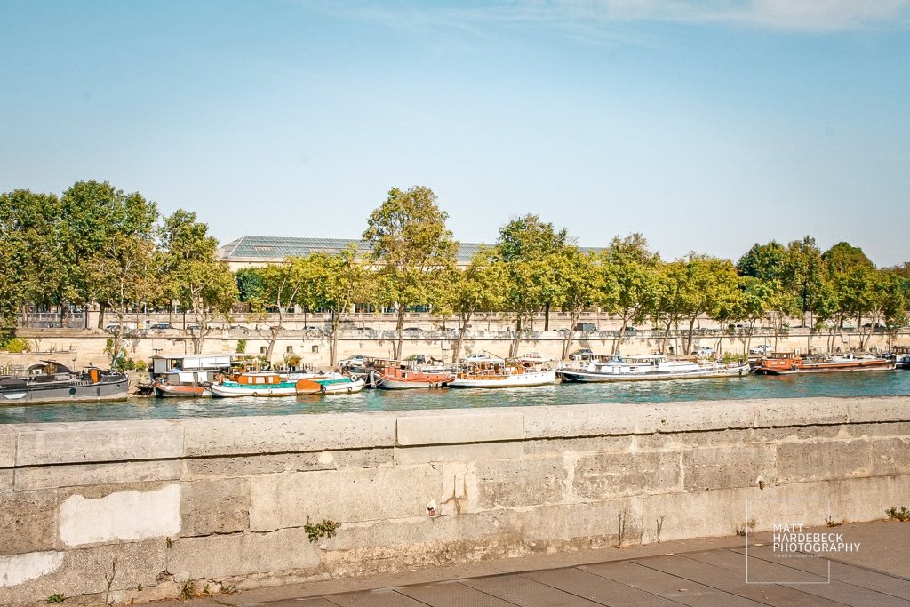Line of houseboats docked along the Right Bank of the Seine